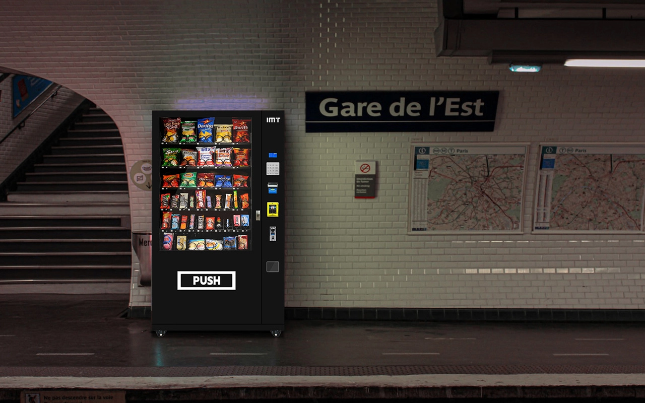 Drink and snack vending machine in a subway station.