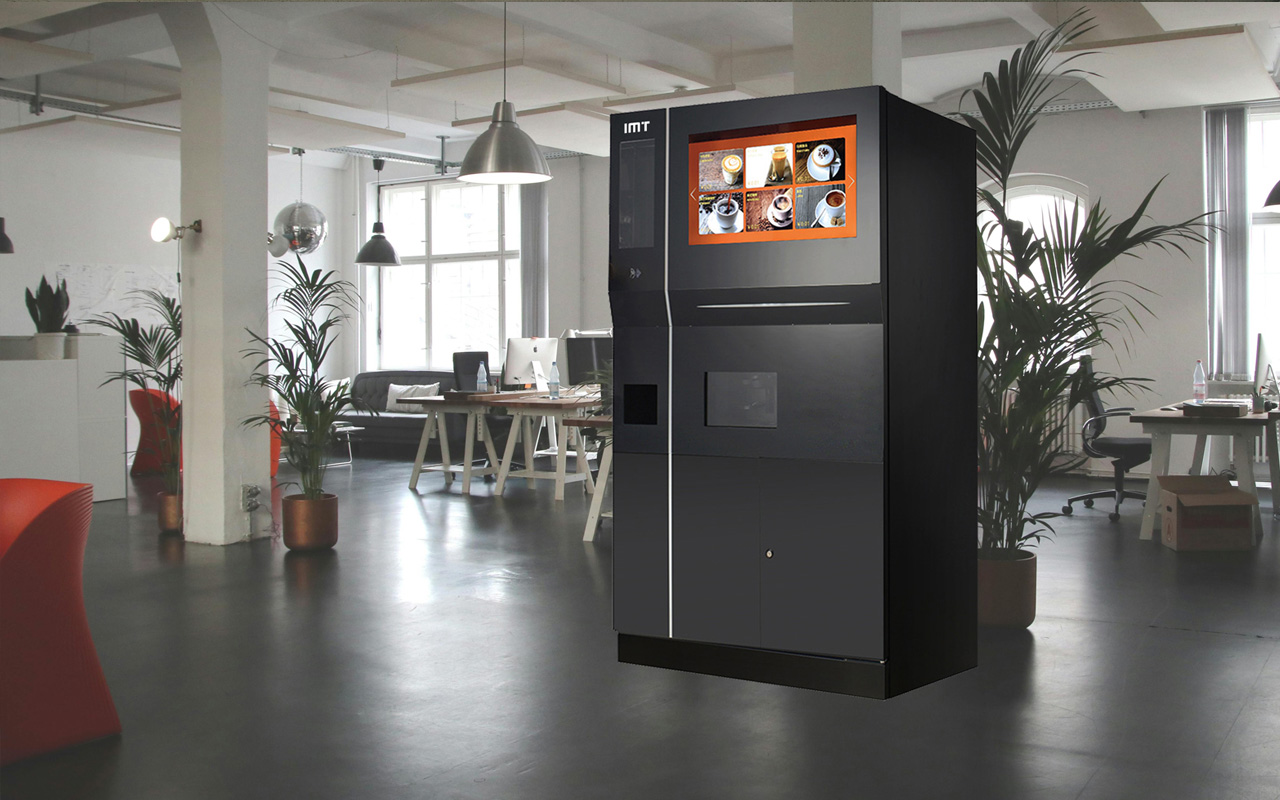 Modern coffee vending machine in a stylish office.