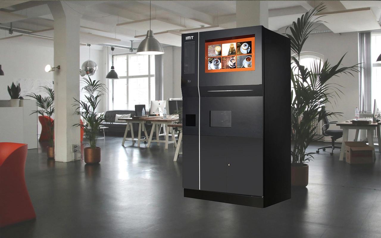 Modern coffee vending machine in a stylish office.