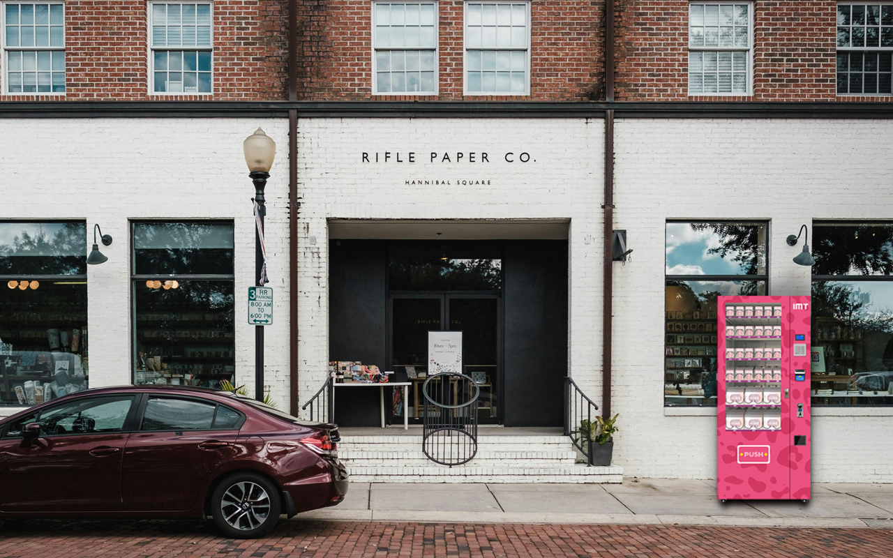 Pink beauty vending machine outside Rifle Paper Co. store.